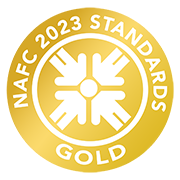 a gold medal with a white and yellow logo reading 'NAFC 2022'